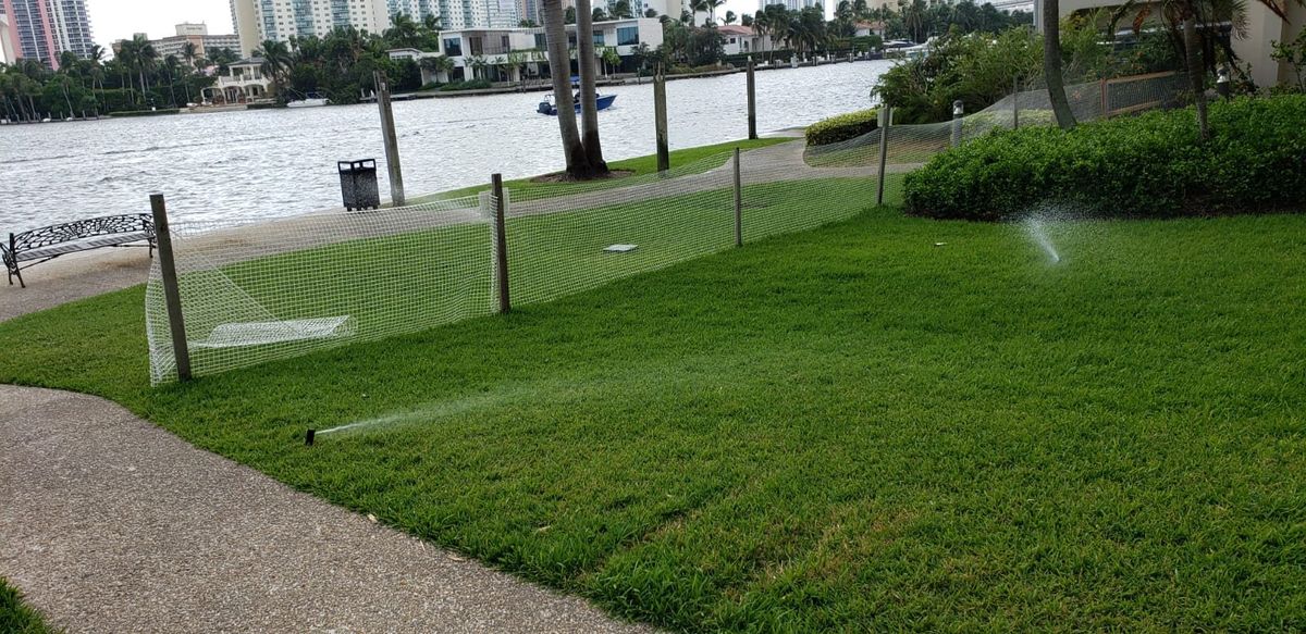 Sprinklers running on a lawn at Turnberry during an irrigation service call